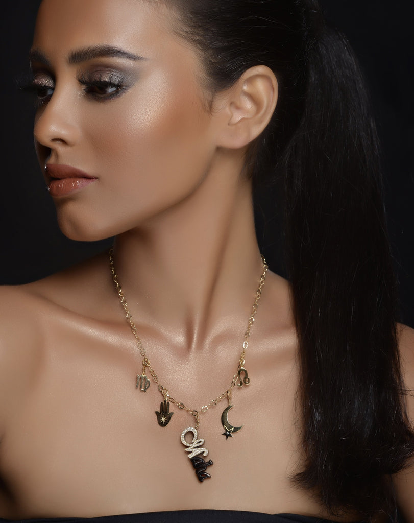 GLAMOUR MULTI CHARMS NECKLACE IN 18 K GOLD WITH BLACK NAME